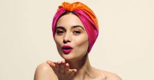 Protect your hair while sleeping by using a silk turban. More information at LuvlyLongLocks.com.