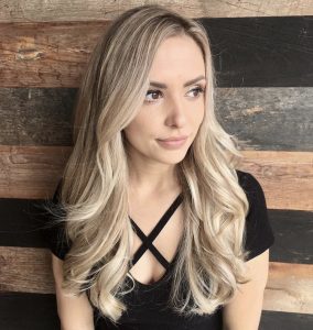 Stylist Jenny Tanzilli specializes in blended beach girl hair.